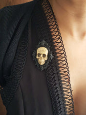 ORNATE RESIN SKULL BROOCH