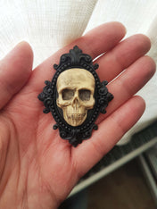 ORNATE RESIN SKULL BROOCH