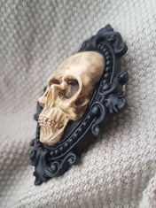 ORNATE RESIN SKULL BROOCH
