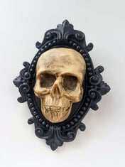 ORNATE RESIN SKULL BROOCH