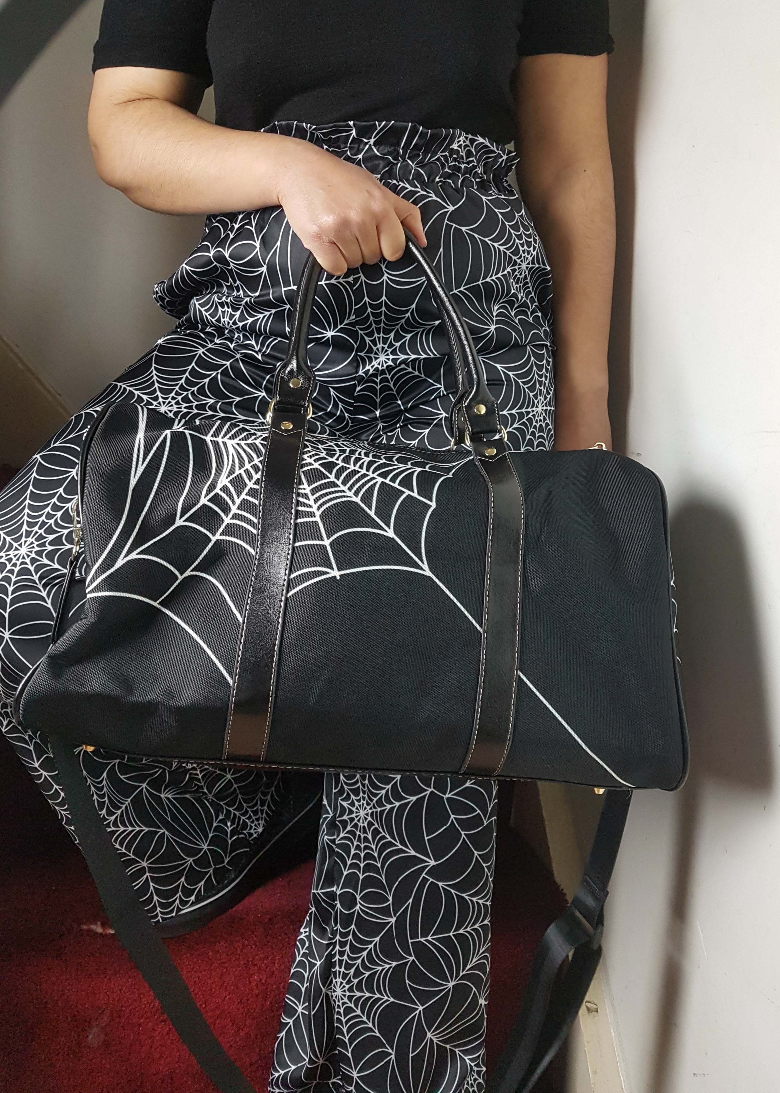BLACK HOLDALL DUFFLE BAG (spiderweb print)