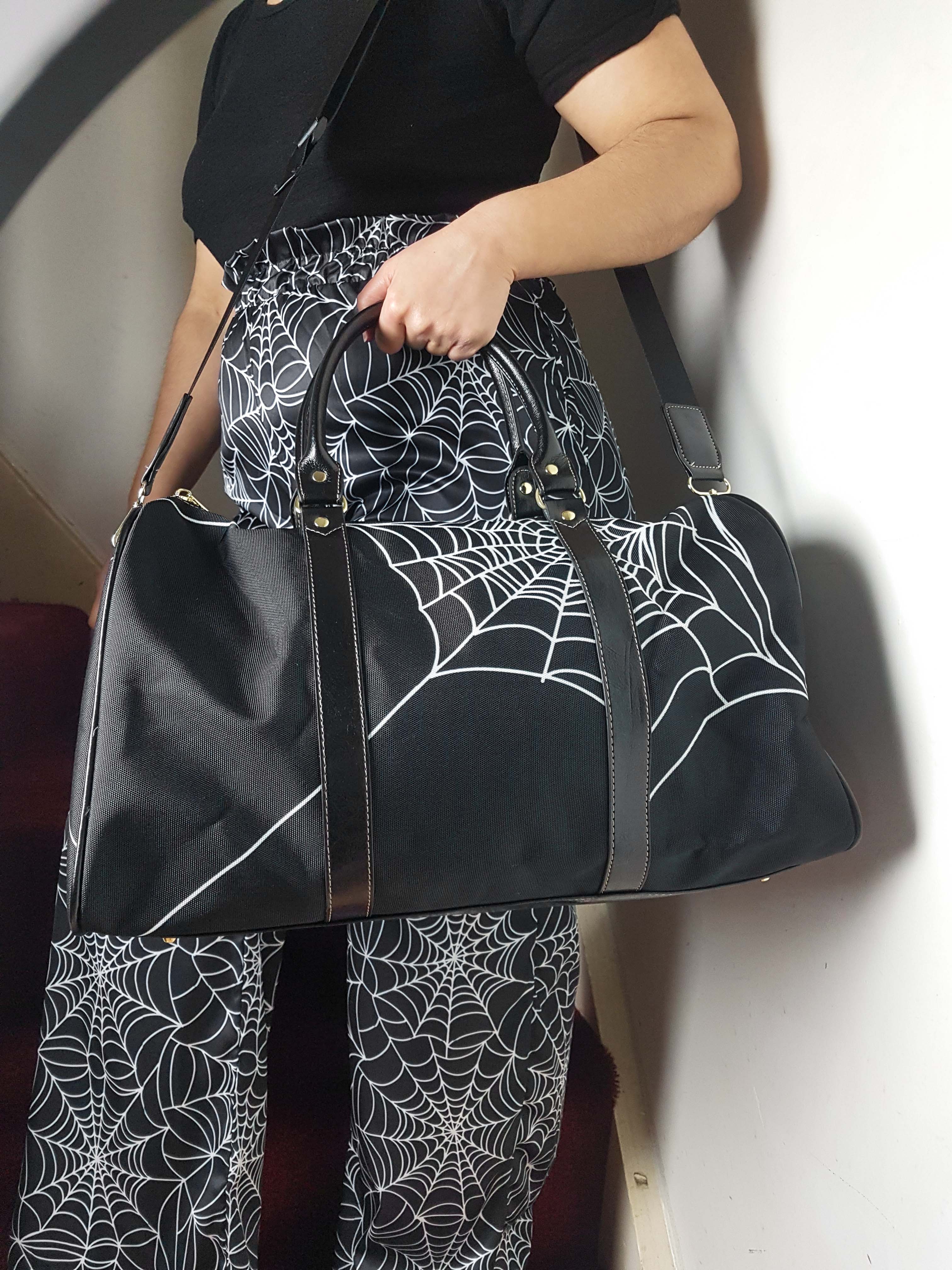 BLACK HOLDALL DUFFLE BAG (spiderweb print)