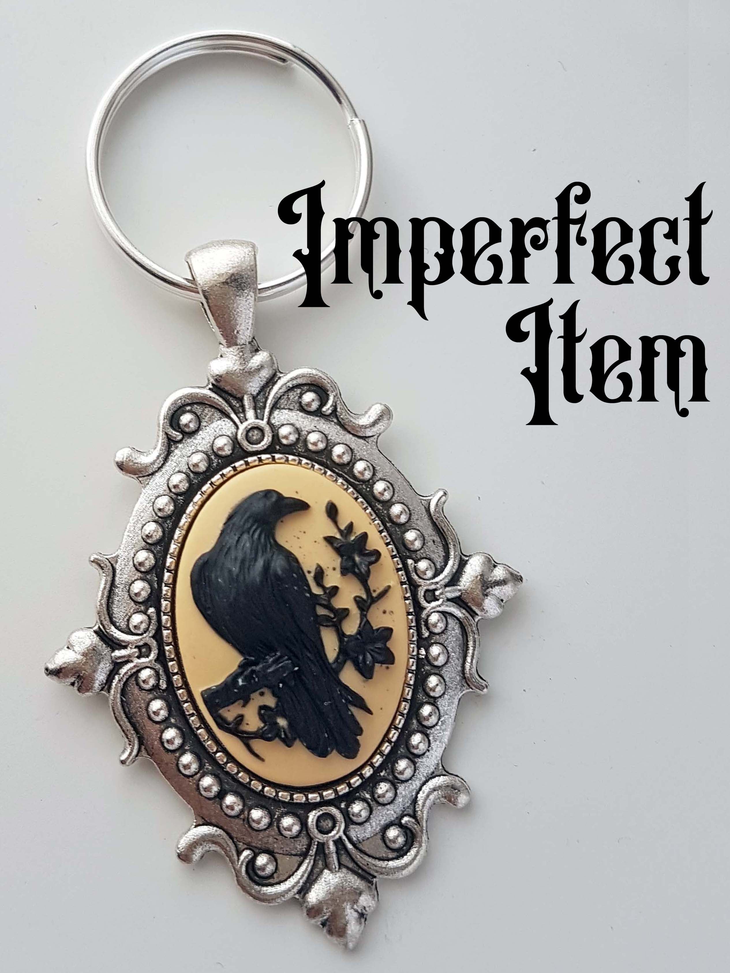 (silver-finish) RAVEN CAMEO KEYRING - imperfect item