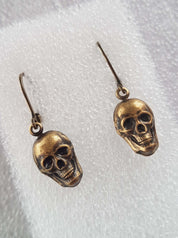 TINY SKULLS CHARM EARRINGS | THEBLACKWARDROBE.COM.