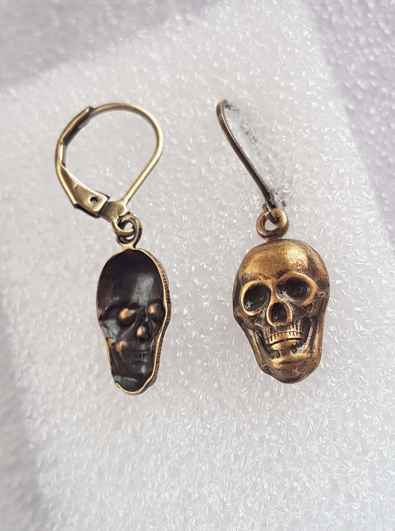TINY SKULLS CHARM EARRINGS | THEBLACKWARDROBE.COM.