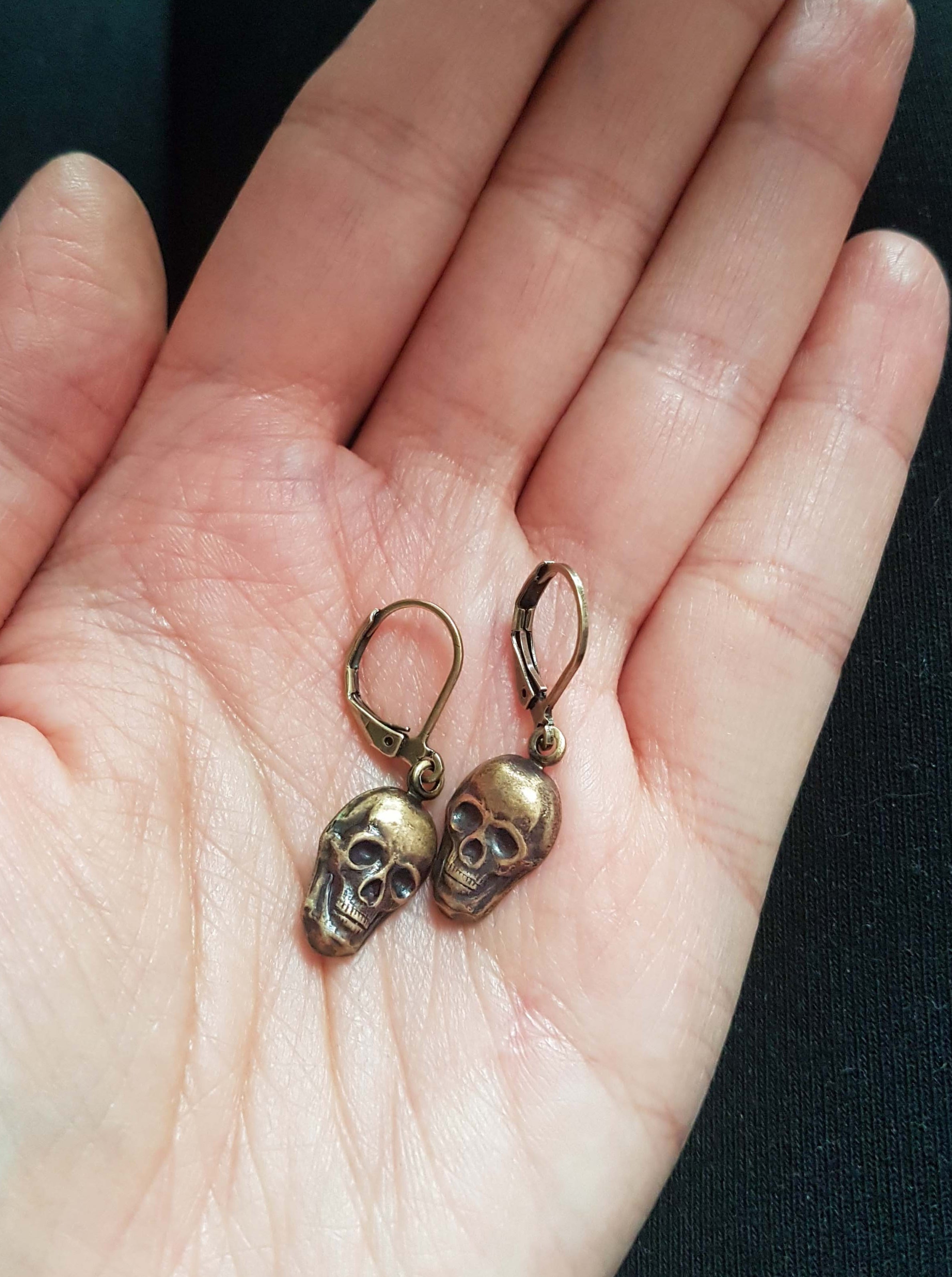 TINY SKULLS CHARM EARRINGS | THEBLACKWARDROBE.COM.