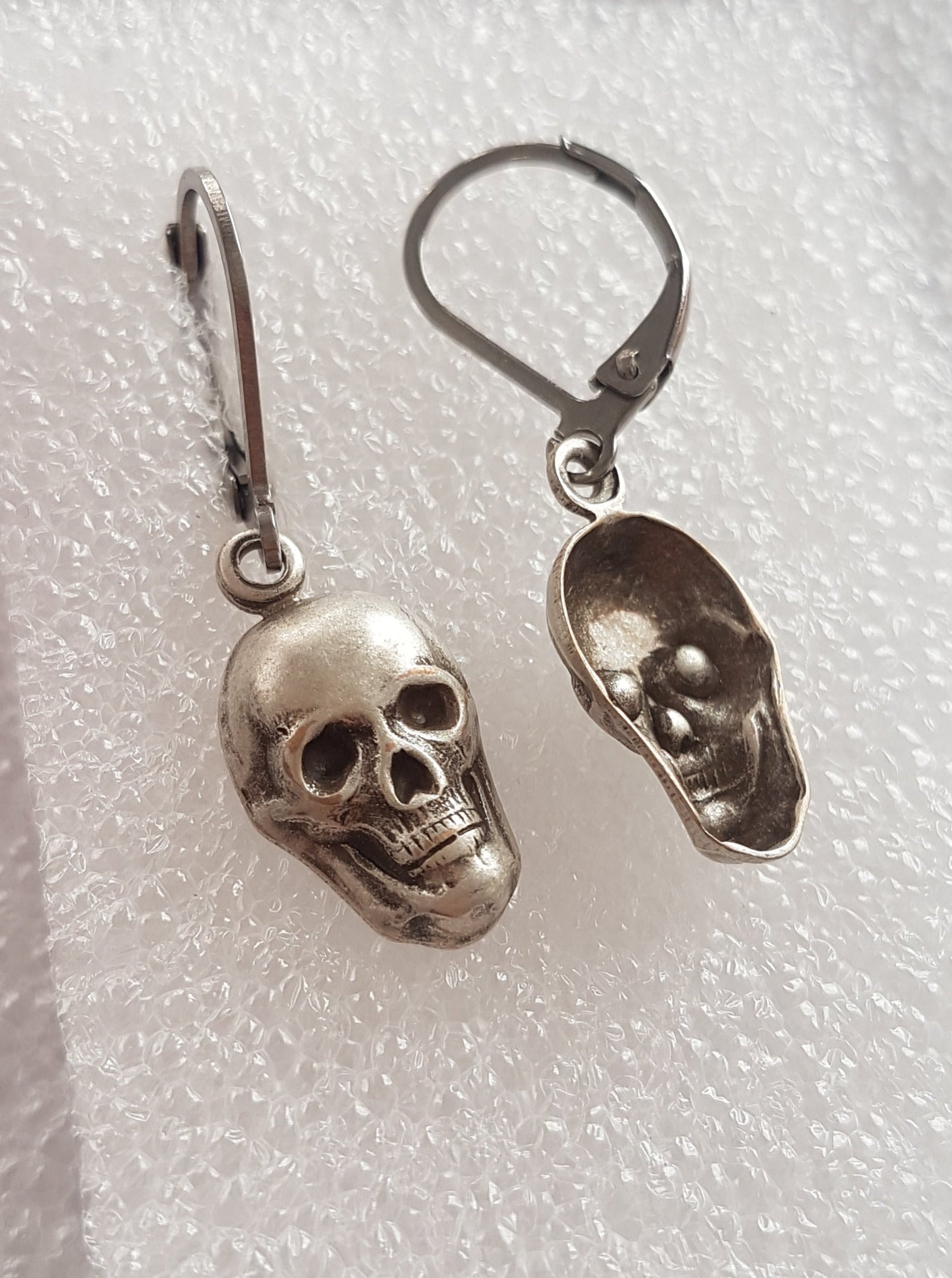 TINY SKULLS CHARM EARRINGS | THEBLACKWARDROBE.COM.