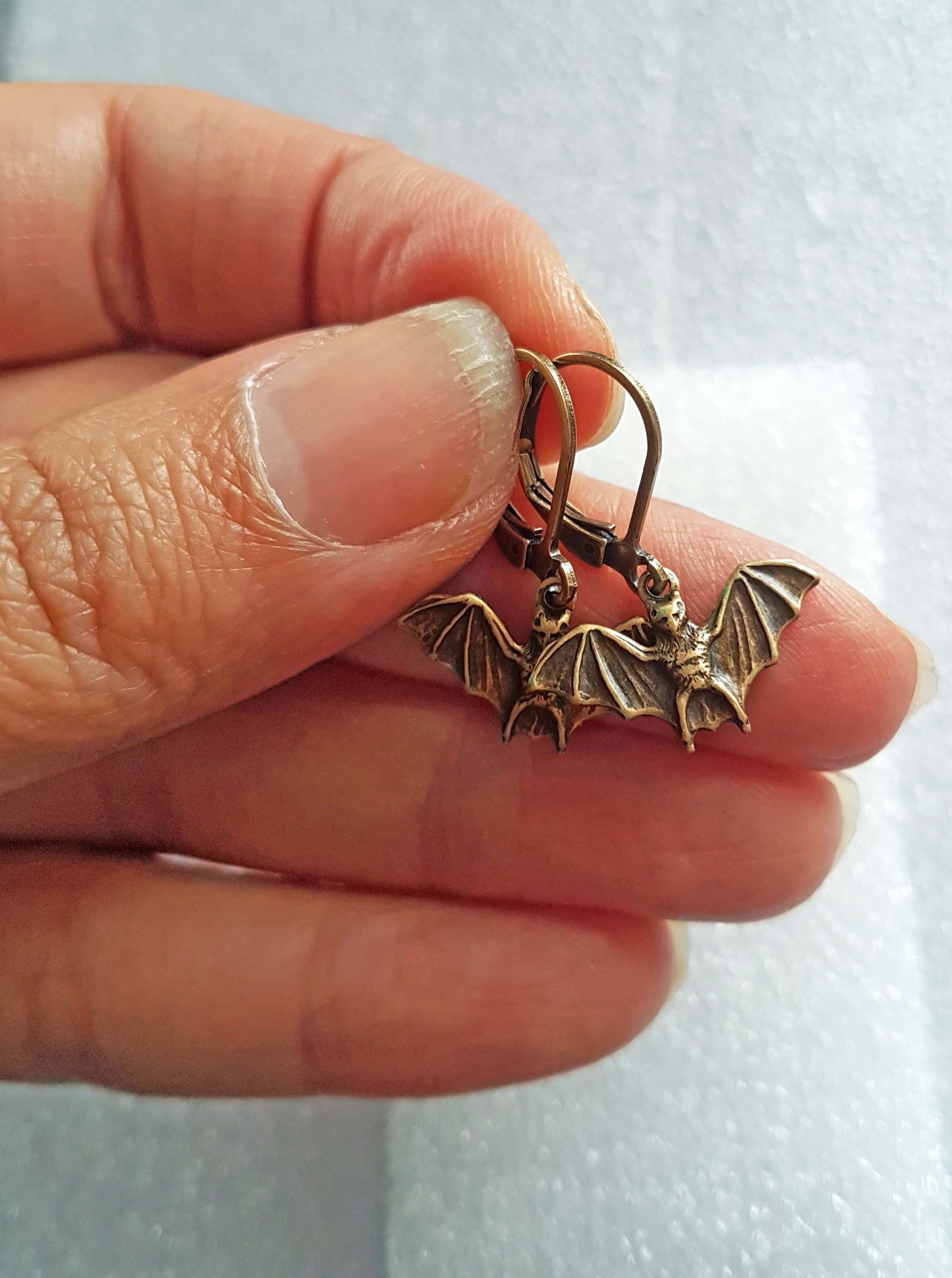 TINY BATS CHARM EARRINGS | THEBLACKWARDROBE.COM.