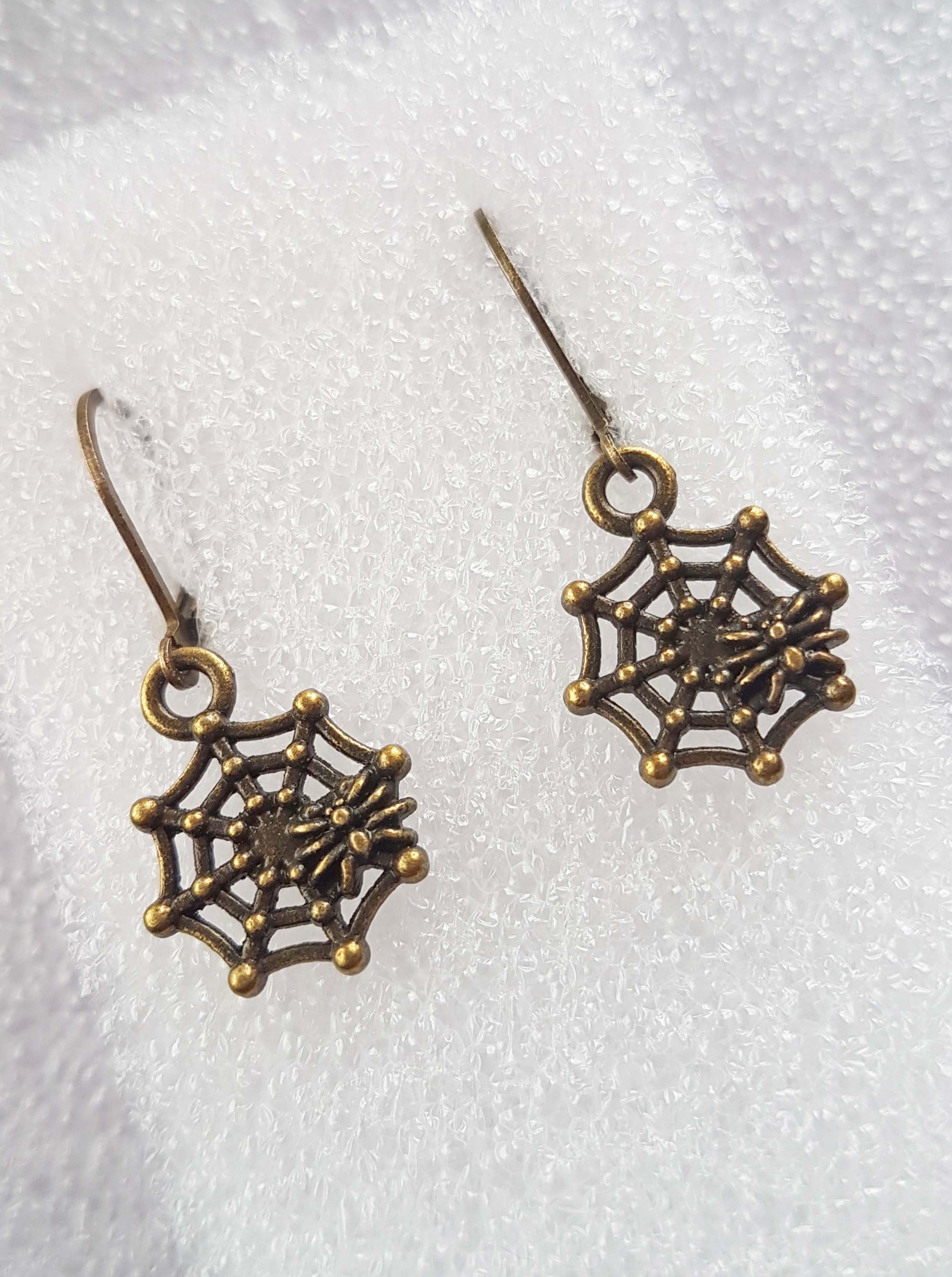 SMALL SPIDERWEB CHARM EARRINGS | THEBLACKWARDROBE.COM.