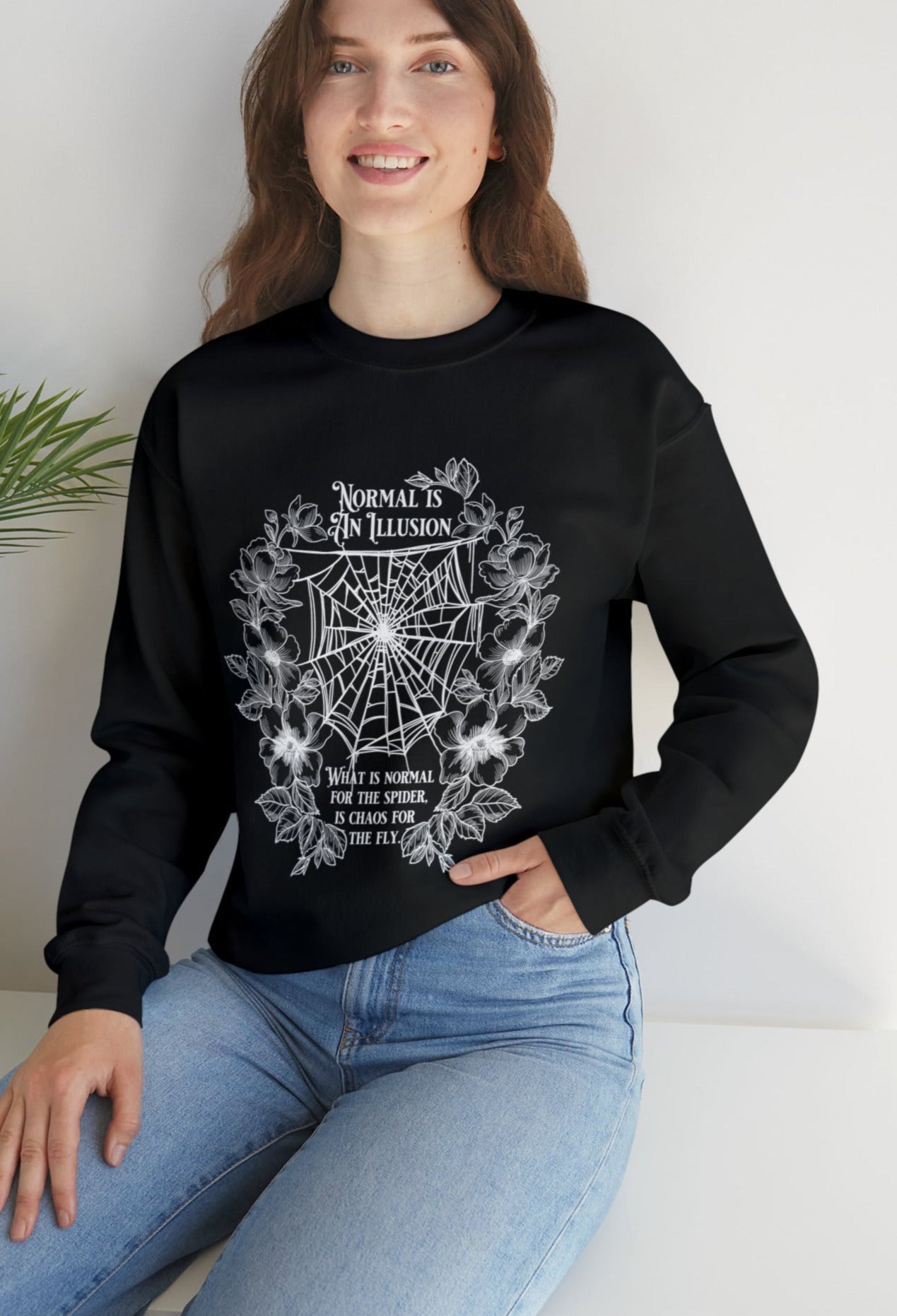 NORMAL IS AN ILLUSION sweatshirt | THEBLACKWARDROBE.COM.