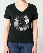 A woman modeling a black V-neck t-shirt with a Vintage style monochrome graphic print of a bat and flowers.