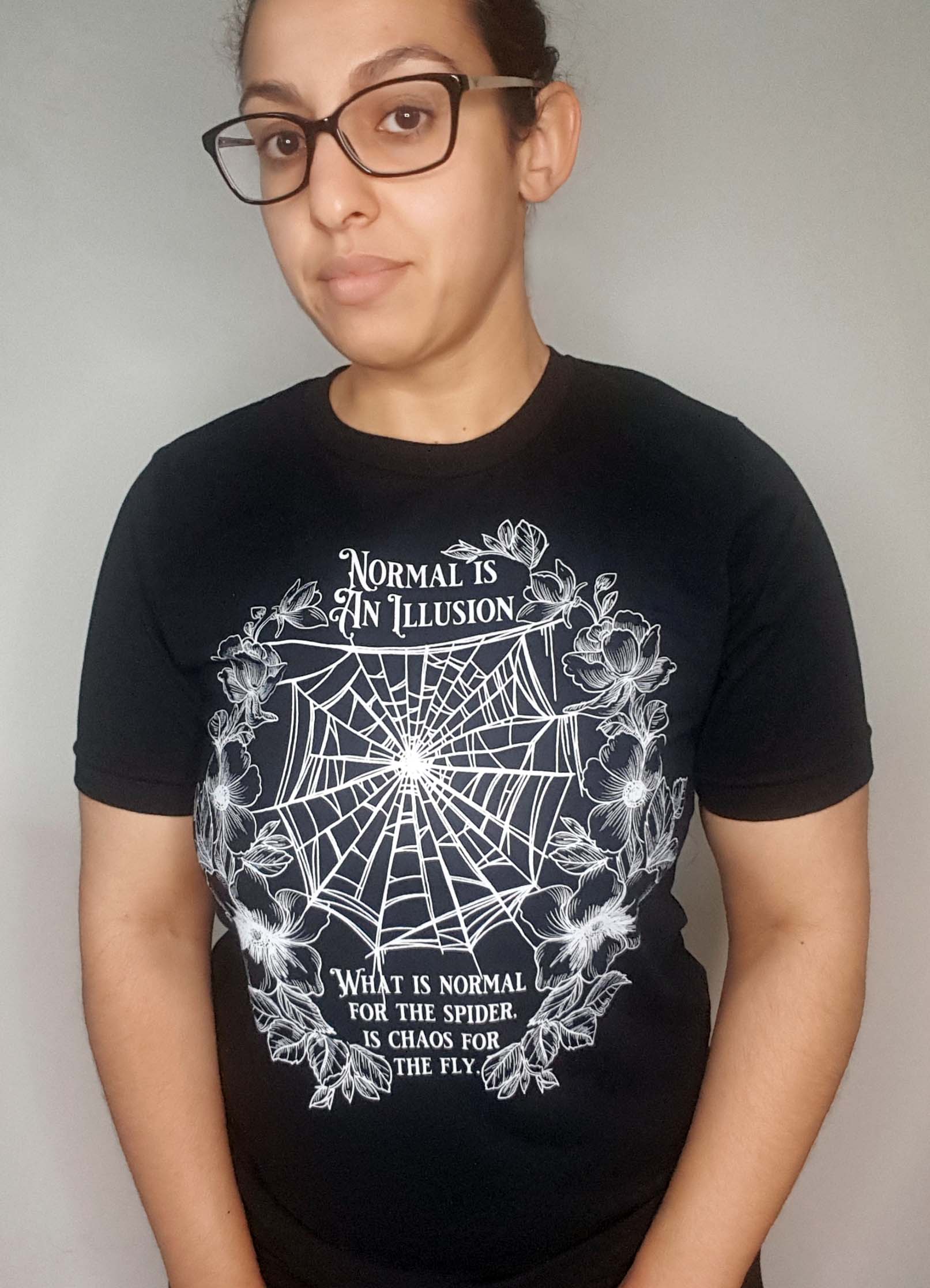 NORMAL IS AN ILLUSION - Morticia Addams quote t-shirt | THEBLACKWARDROBE.COM.