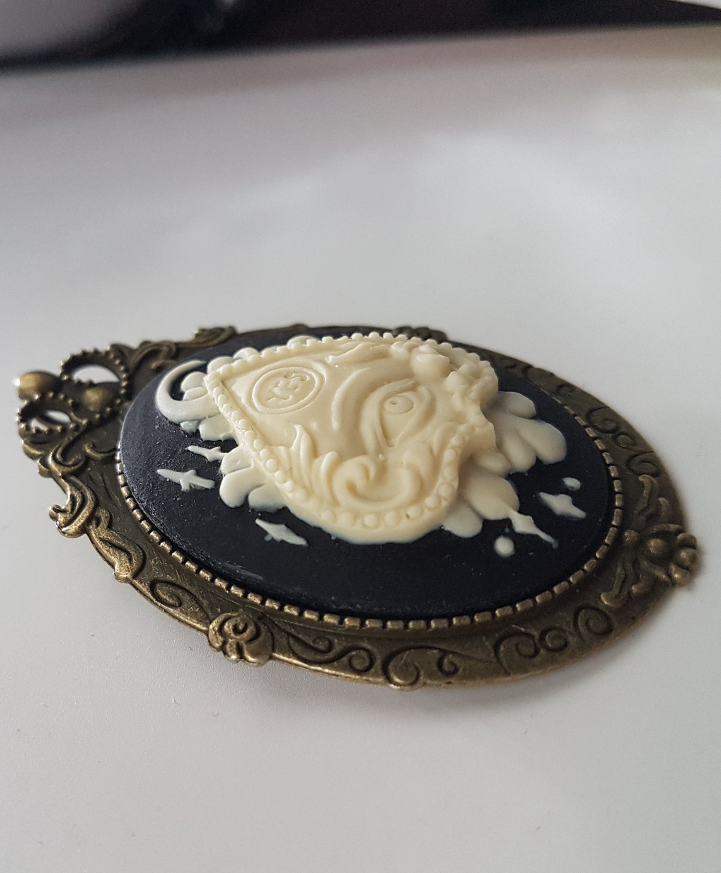 OUIJA PLANCHETTE CAMEO BROOCH | THEBLACKWARDROBE.COM.
