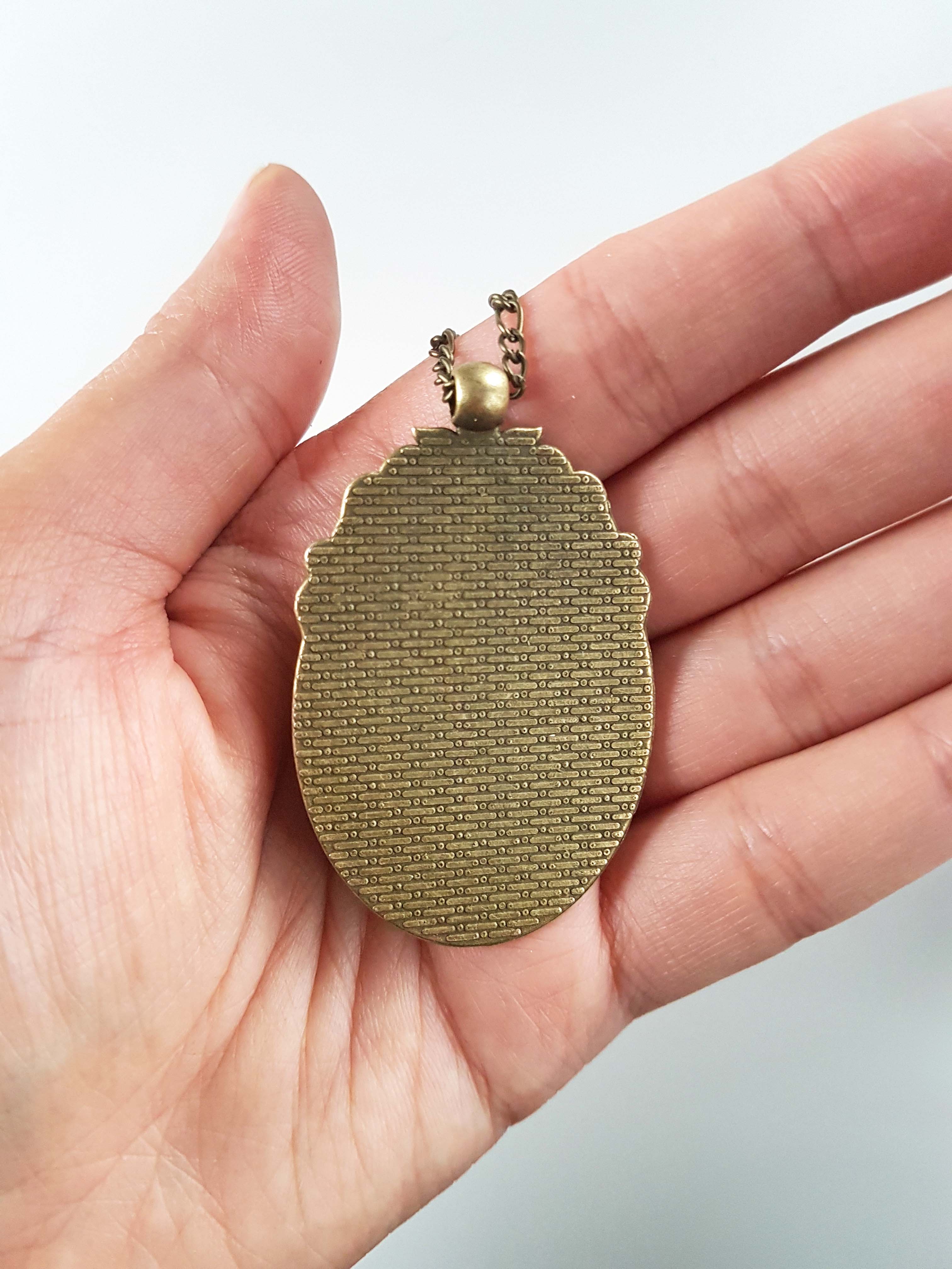 OUIJA PLANCHETTE CAMEO NECKLACE | THEBLACKWARDROBE.COM.