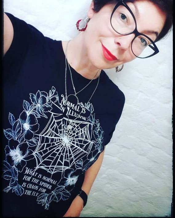 NORMAL IS AN ILLUSION - Morticia Addams quote t-shirt | THEBLACKWARDROBE.COM.